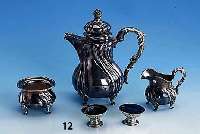 Goudroniertes 3-teil. Mokkaservice, um 1900, 925er Silber, Meistermarke ERD unged., auf 4 FÜßen stehend, best. aus: Kanne (Deckel mit ...