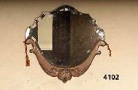 Spiegel, Frankreich, um 1910, Jugendstil, Eiche massiv, geschwungene Form, mit Schnitz- erei, Spiegelglas facettiert und geometrisch geschwungen, ...