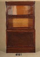 BÜcherschrank, Berlin, um 1910, Korpus Weichholz, Eichefurnier, einzelne FÄcher auf- klappbar, ca. 150x86x43 cm, ohne SchlÜssel