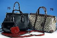 Kleine GUCCI-Reisetasche, Canvas/braunes Leder , Tragegriffe, ca. 26 x 40 cm, neuwertig