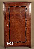 Schrank, deutsch, um 1850/60, starkes Eschefurnier, eintÜrig, geschwungene vertiefte TÜrfÜllung, Leisten und FÜße ergÄnzt, Alters- und ...