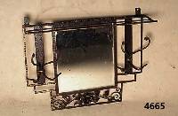 Jugendstil Gaderobe, um 1910, Eisen, leicht bronziert, mit 2 Kleiderhaken und Hutablage, Spiegel facettiert, leichte Gebrauchsspuren, ca.54x69x21 ...