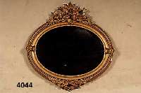 Spiegel, deutsch, um 1870/80, Holz gestuckt, ursprÜnglich vergoldet, hier bronziert, Spiegelglas minimal beschÄdigt, ca. 77x75 cm