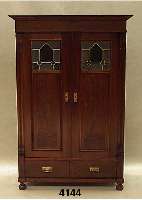 Schrank, deutsch, um 1900, aus verschiedenen ObsthÖlzern, nußbaumfarben, Kopfleiste spÄter , TÜren mit Flachschnitzereien, Oberteil mit ...