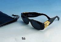 VERSACE-Sonnenbrille Mod. 414/H BÜgel seitl. mit typ. Versace-Applikation und buntem Straßbesatz, kaum getragen, orig. Futeral, SammlerstÜck
