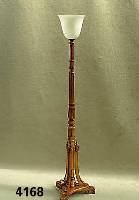 Stehlampe, Frankreich um 1910, mit Opalinschirm, Holzfuß mit Schnitzereien, goldpatiniert, H. ca. 177, D. Fuß ca. 42 cm