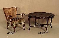 Couchtisch, deutsch, um 1930, Chippendale- stil, Nußbaum massiv, mit geflochtenem Korb- geflecht, geschwunge Beine, H. ca. 58 cm, D. ca. 96 cm