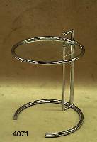 Eileen Gray Beistelltisch, "Adjustable table", Chromgestell, hÖhenverstellbar, einge- legte Glasplatte, mit original Klebeschild, ca.