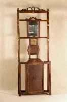 Garderobe, deutsch, um 1900, Eiche massiv, braun gebeizt, Durchbrucharbeit, vielfach kanneliert, 7 originale Messinghaken, original Spiegel, ...