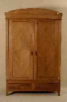 Kleiderschrank, deutsch, um 1910, Jugendstil , Korpus Weichholz, Nußbaumfurnier, 2-tÜrig, Kopfteil geschwungene AusfÜhrung, Sockelge- schoß mit ...