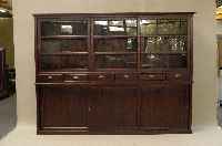 Bibliotheksschrank, Englischer Stil, Teak- holz massiv, nach Vorbild von 1900, im Oberteil 3 SchiebetÜren, diese verglast, mittig 6 Schubladen, ...
