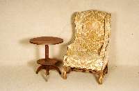 Ohrenbackensessel, deutsch, um 1910/20, im FrÜhbarockstil, Nußbaum massiv, FÜße verschrÄnkt, vielfach geschwungen, Nagelver- zierung, ...