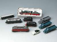 4 MÄrklin Gußmodelle, 50er/60er Jahre, 3 LKW , 1 Polizeiporsche, alle neu lackiert, guter Zustand