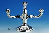 3-flammiger Kerzenleuchter, deutsch ca. 30er Jahre, 835er Silber, Barockstil, gefÜllt, Bodenplatte Metall, total ca. 475 g, H ca. 22 cm, B ca. ...