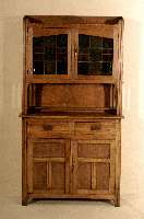 Buffetschrank, deutsch, um 1920, Eiche und Weichholz, Oberteil 2-tÜrig, bunt verglast, Tellerboard, MÖbel in schlichter AusfÜhrung, leichter ...