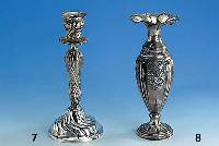 1-armiger Kerzenhalter, 800er Silber, deutsch um 1910, godroniert, 4-fach gegliedert, Rokokostil, H. ca. 28 cm