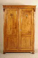 Schrank, deutsch, um 1880/90, Kirschbaum massiv, zweitÜrig, zerlegbar, die Innenfelder der TÜren mit evtl. spÄter aufgemalten Ornamenten ...