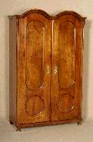 Schrank, um 1880/90, Kirschholz massiv, zerlegbar, zweitÜrig, doppelt gebogter oberer Abschluß, Alters- und Gebrauchsspuren, ca. 182 x116x50 cm