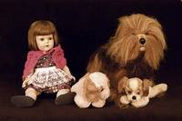 Puppe, wohl Arthur SchÖnau, um 1920/30, Celluloid, braune feststehende Glasaugen, offener Mund, ZÄhne oben l. besch., braune EchthaarperÜcke, ...