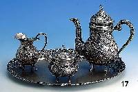 Teekanne, Zuckerdose und Sahnegießer auf Tablett, 800er Silber, total ca. 1460 g, Rokaillen- und Muscheldekor, 4 FÜße, Kannenh. ca. 19 cm, ...