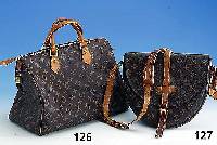 Louis Vuitton-Tasche, Nr. SP0977, Serie Monogram Canvas, Modell Speedy, Innen- tasche, 2 Tragegriffe, Schloß, SchlÜssel anbei , l. Gebr.-Sp.