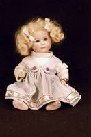Porzellankopfpuppe, Heubach KÖppelsdorf, um 1915, Charakterkopf, MassegliederkÖrper, Steifgelenke, braune Paperweightschlafaugen, geschl. Mund, ...