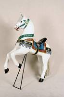 Karusselpferd, 70er/80er Jahre, Teakholz massiv, in den 90er Jahren restauriert und neu bemalt, H. ca. 58 cm, L. ca. 66 cm