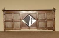 Wandgarderobe, deutsch, um 1900, Eiche massiv, Inlets mit Leder bezogen, original Haken aus Messing, in der Mitte Spiegel mit Facettschliff, ...