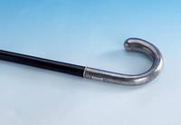 Spazierstock, wohl Berlin um 1900, Knauf 800er Silber, quadr. tauschiert, Namensnennung J Stiepe. Fredeburg, Schuss aus Makasar, schwarz gelackt, ...