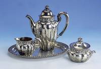 4-teiliges Teeservice, deutsch Bruckmann Heilbronn um 1910, 800er Silber, bez. GM Berge, Hammerschlagverzierung, reine Treibarbeit, Wandungen ...