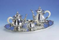 Kaffee- und Teeservice, 830er Silber, wohl Koch & Bergfeld zw. 1928-1929, bestehend aus: Kaffeekanne, Teekanne und Sahnegießer auf Tablett, ...