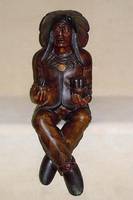 Karusselfigur, 2. HÄlfte 20. Jh., sitzender Indianer, aus dem Vollholz geschnitzt, l. Gebrauchsspuren, 103 x 34 cm