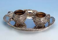 Zuckerschale und Sahnegießer auf Tablett, Puttendekor, deutsch, 800er Silber, Wilhelm Weinranck Hanau, total ca. 540 g, Tablett can 26 x 18,5 cm