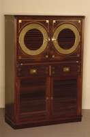 Mehrzweckschrank, deutsch, um 1960, Schiffsmodel, Korpus Weichholz, z.T. Tischlerplatte, Palisanderfurnier, bullaugenfÖrmige FÜllungen aus ...