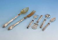 4-tlg. Petit-Fours-Besteck, Frankreich um 800er Silber, Arbeitsteile Metall, versilbert, reicher, historistischer Dekor