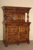 Aufsatzschrank, Flandern, um 1870, Eiche massiv, Unterteil 2-tÜrig, FÜllungen mit volkstÜmlichen Darstellungen, Oberteil getragen von ...