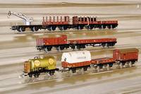 Konvolut MÄrklin, 50er Jahre, Spur HO, best. aus: Niederbordw. 364 K, GÜterw. 371 K, Kranw. 366 NK, Rungenw. 372 K, Stammholzw. 372 BK und ...