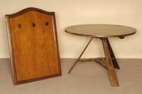 Runder Tisch, um 1910, Eiche massiv, z.T. furniert, rustikal gebeizt, stehend auf verstrebtem Dreifuß, Platte abklappbar, Gebrauchsspuren, H. ca. ...