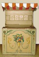 Kaufladen, 30er Jahre, Theke lt. Einl. mit orig. Malerei von Adolf Kessler, diese um 1936/37, Regal mit 8 beschrifteten Schubladen, Alters- und ...