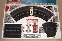 Carrera-Bahn, 70er Jahre, Nr. 30450, NÜrburg , mit Steilkurve, Vollst. nicht geprÜft, Fkt. nicht geprÜft, im orig. Karton, mit 3 Autos, bespielt