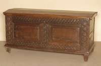 Truhe, deutsch, datiert 1824, Eiche massiv, Front mit kassettierten FÜllungen, Lisenen aus dem Vollholz geschnitzt, leicht gebogener Deckel, ...