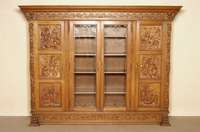 BÜcherschrank, Belgien, um 1920, Eiche massiv, seitlich mit kassettierten FÜllungen, Front auf schwerer Fußleiste, 16-fach gestuft, 4-tÜrig, ...