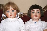Porzellankopfpuppe, SchÜtzmeister & Quent, um 1920, 201, MassekÖrper, blonde EchthaarperÜcke, feststehende blaue Glasaugen, offener Mund, zwei ...