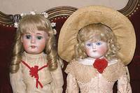 Porzellankopfpuppe, wohl CF kling, um 1910, gestopfter StoffkÖrper, geschlossener Mund, blonde MohairperÜcke, Kleidung aus alten Stoffen, z.T. ...