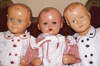 Konvolut aus drei grossen Celluloidpuppen, 40er J., Babys: 1x wohl SchildkrÖt; modellierte Haare, blaue u. braune Glasaugen, mit Wimpern diese ...