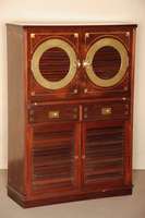 Mehrzweckschrank, deutsch, um 1960, Schiffsmodel, Korpus Weichholz, z.T. Tischlerplatte, Palisanderfurnier, bullaugenfÖrmige FÜllungen aus ...