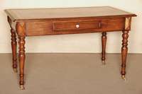 Schreibtisch, deutsch, um 1880, Nußbaum massiv, Nußbaum furniert, Zarge mit Schublade, Platte mit goldgeprÄgter roter Lederauflage, ...