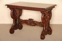 Tisch, deutsch, um 1880, Danziger Barockstil , Nußbaum massiv, wuchtiger Fuß, geschnitzter Wassermann und florales Dekor, Zarge umlaufend ...