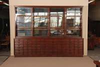 Apothekerschrank, deutsch, um 1910, Eiche massiv, z.T. Weichholz, unten mit 48 Schubladen, Oberteil mit GlasschiebetÜren, viele Ablagebretter, ...