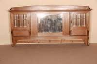 HÄngegarderobe bzw. -regal, deutsch, um 1910 , Eiche massiv, z.T. furniert, mittig ein Spiegel, seitlich 2 TÜren mit facettgeschliffenem Glas, ...